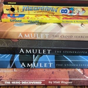 6 GRAPHIC NOVELS: graphix books Mage V3, Amulet 1-3 & Megaman V8, + Elfquest V1